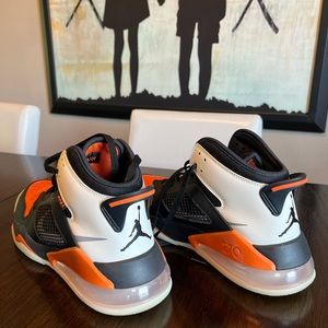 Men’s Nike Air Jordan Mars size 10, black, white, and orange